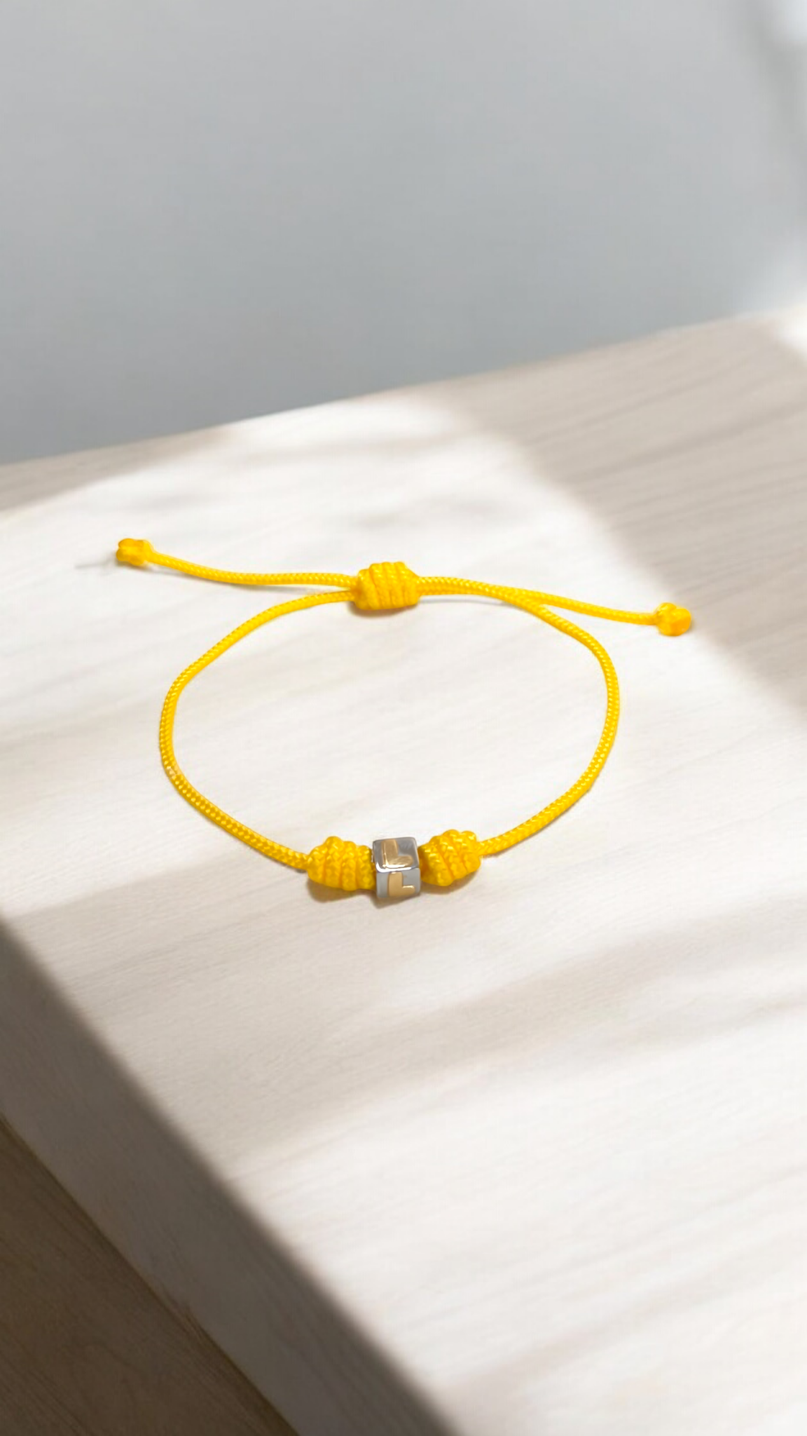 Bracciali Braccialetto Dado lettera L acciaio e oro - Gioielli Pavan