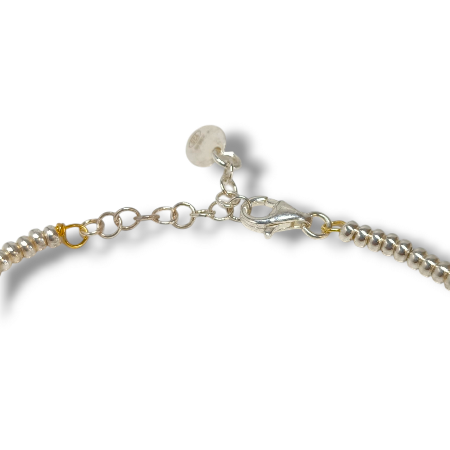 Bracciale Bracciale in argento con virolette bianche con cuori traforati dorati centrali - Gioielli Pavan