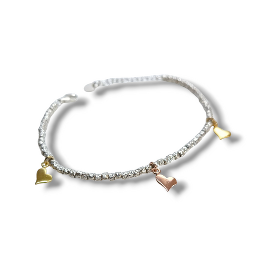 Bracciale Bracciale in argento a dadini con ciondoli a cuore dorati - Gioielli Pavan
