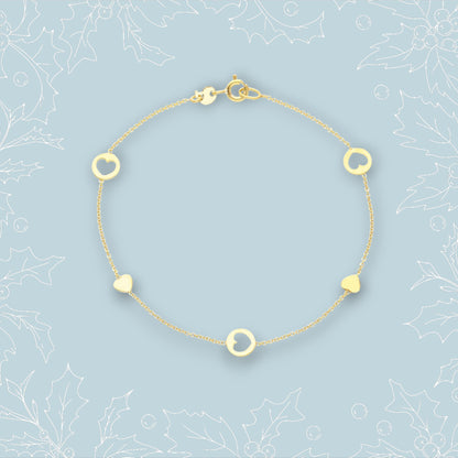 Bracciale in oro con cuori piatti e traforati