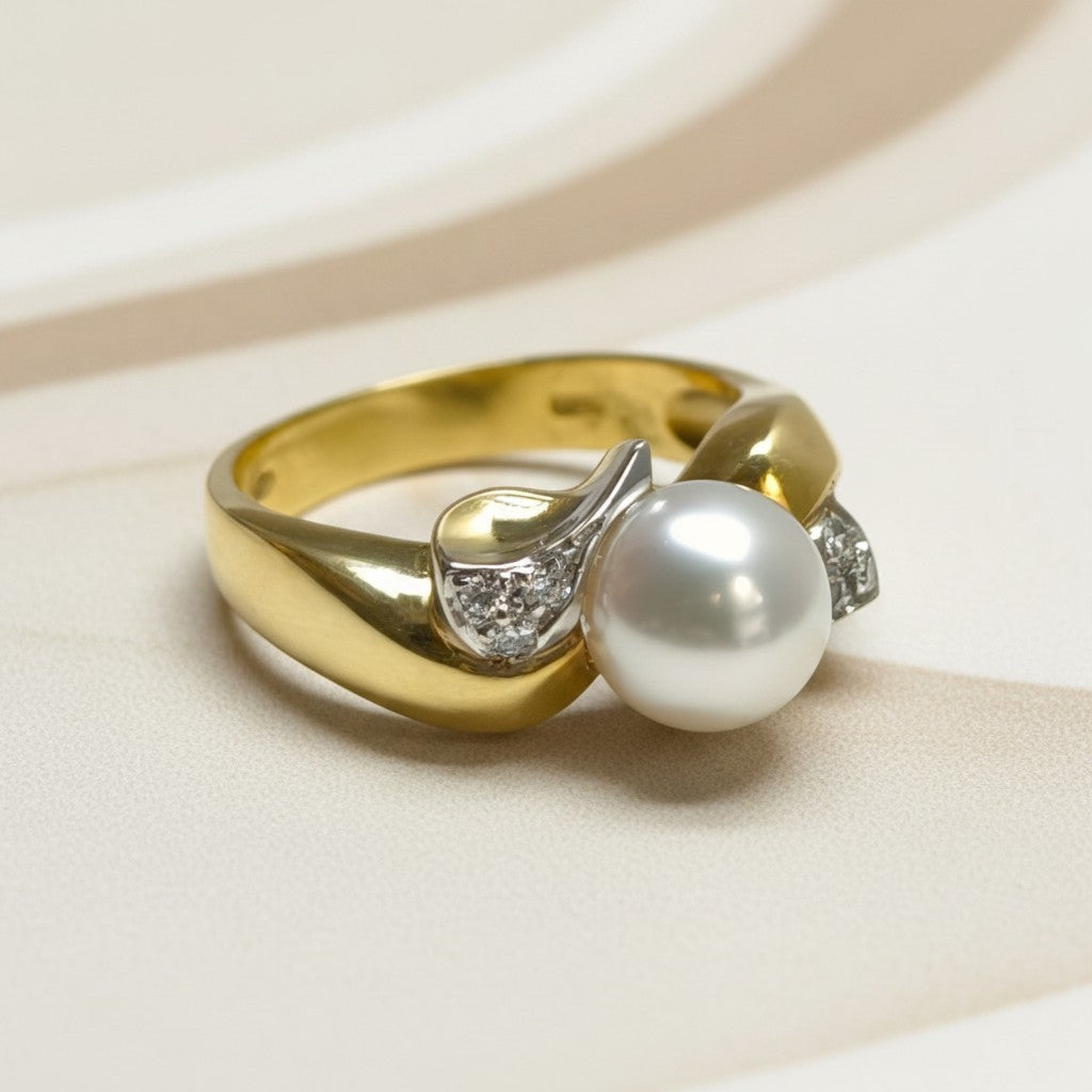 Anello in oro 18kt giallo e bianco con perla e diamanti