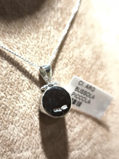 Silver necklace with compass