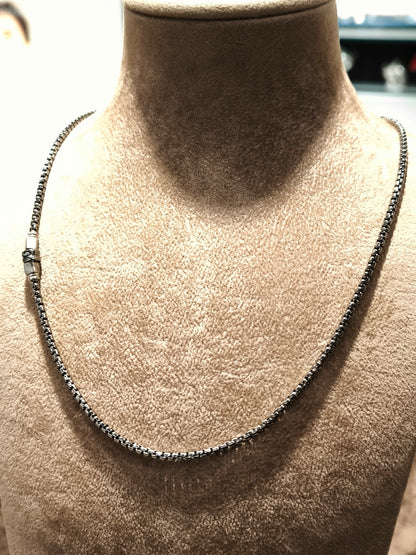 Geometric necklace in burnished silver