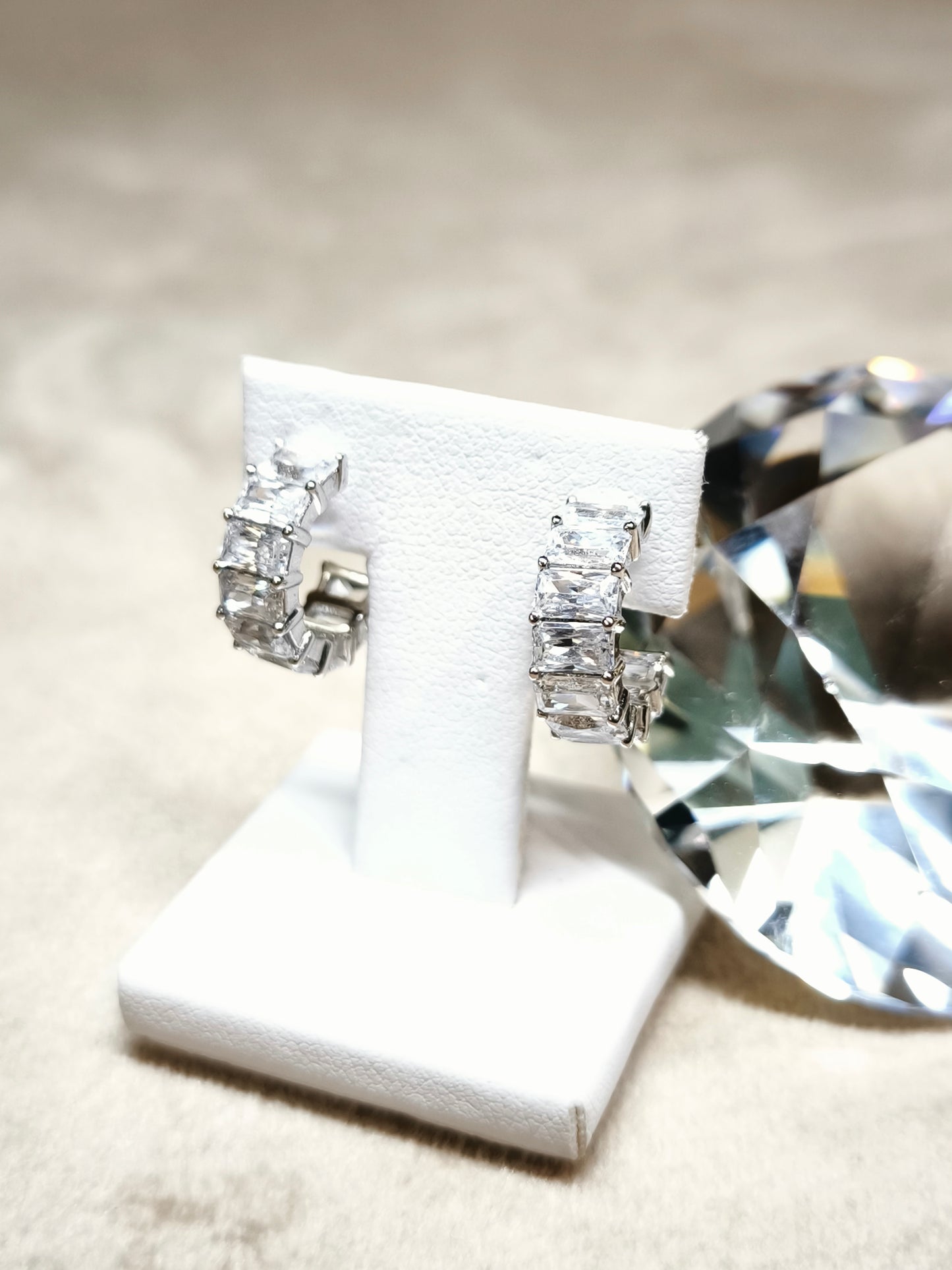 Silver stud earrings with baguette zircons