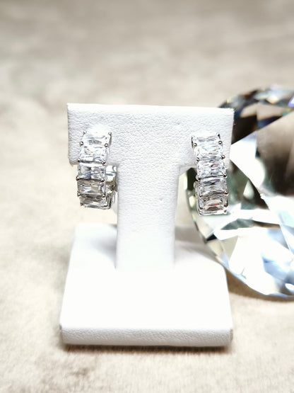 Silver stud earrings with baguette zircons