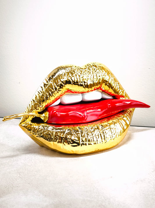 Golden Pop-art mouth with chili pepper