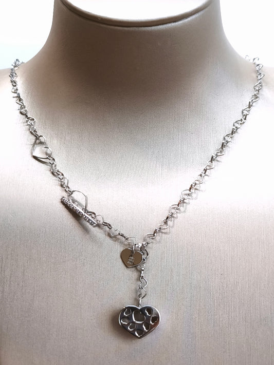 White gold necklace with hearts and diamonds