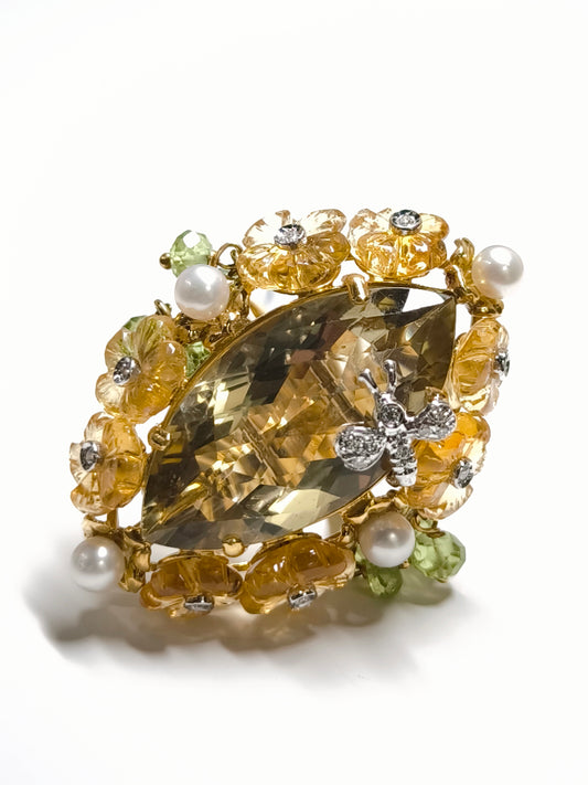 Gold floral ring with diamonds and quartz