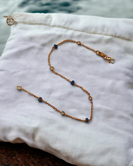 Rose gold bracelet with blue stones and zirconia