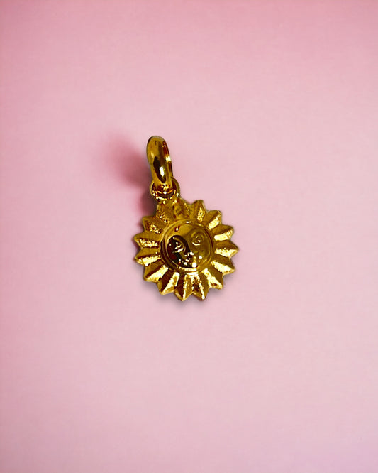 Yellow gold sun pendant with satin face