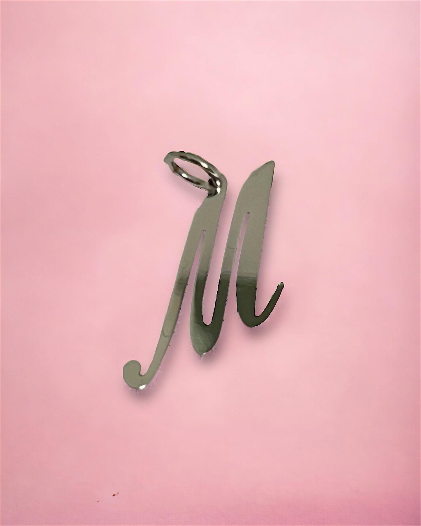 White gold letter M pendant