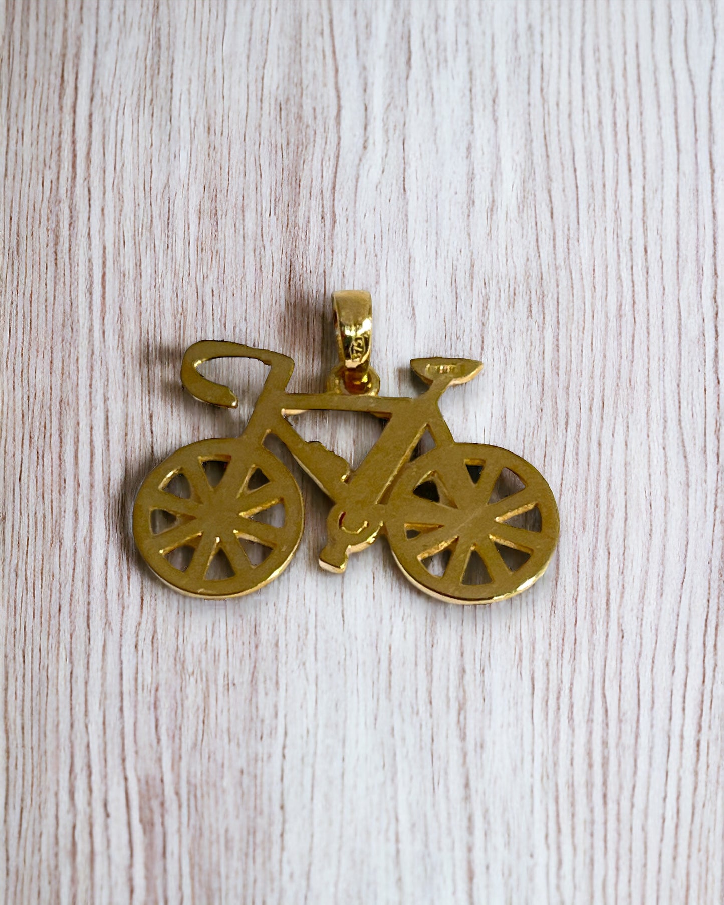 Yellow gold bicycle pendant