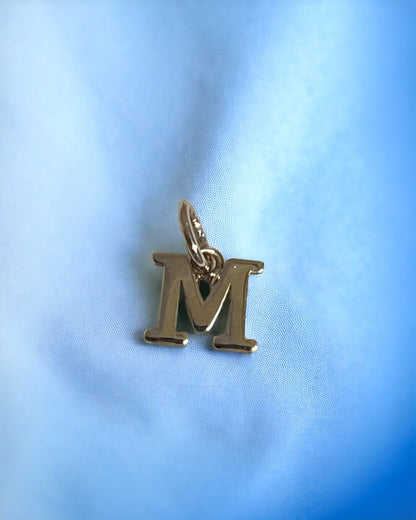 White gold block letter M pendant