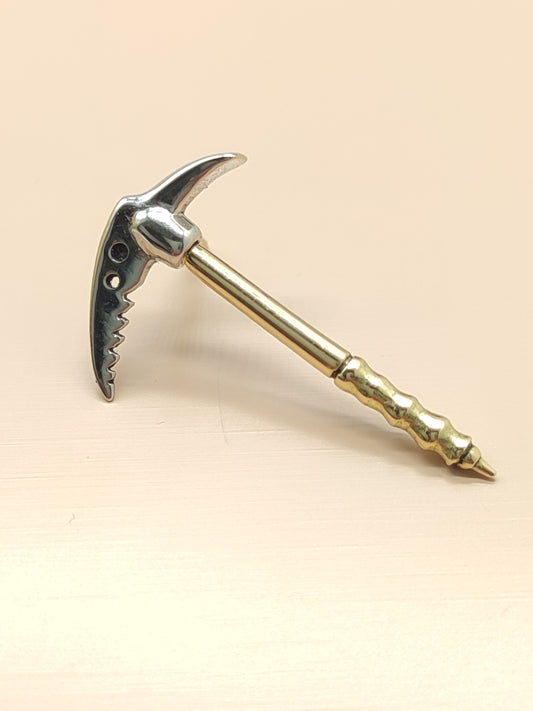 Gold tip in the shape of an Alpine ice axe