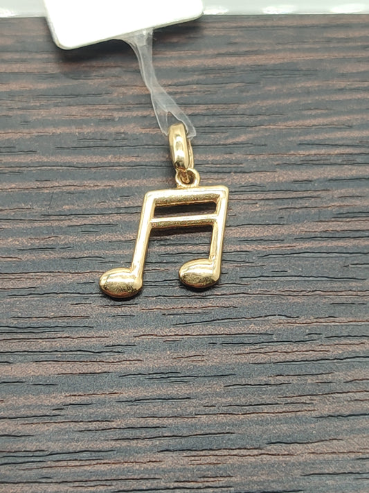Musical note pendant in gold