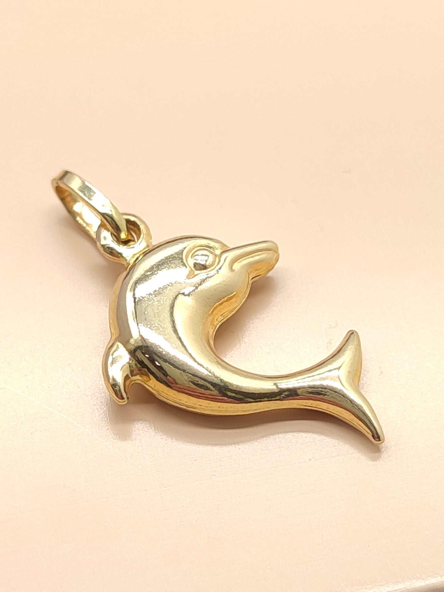 Dolphin gold pendant
