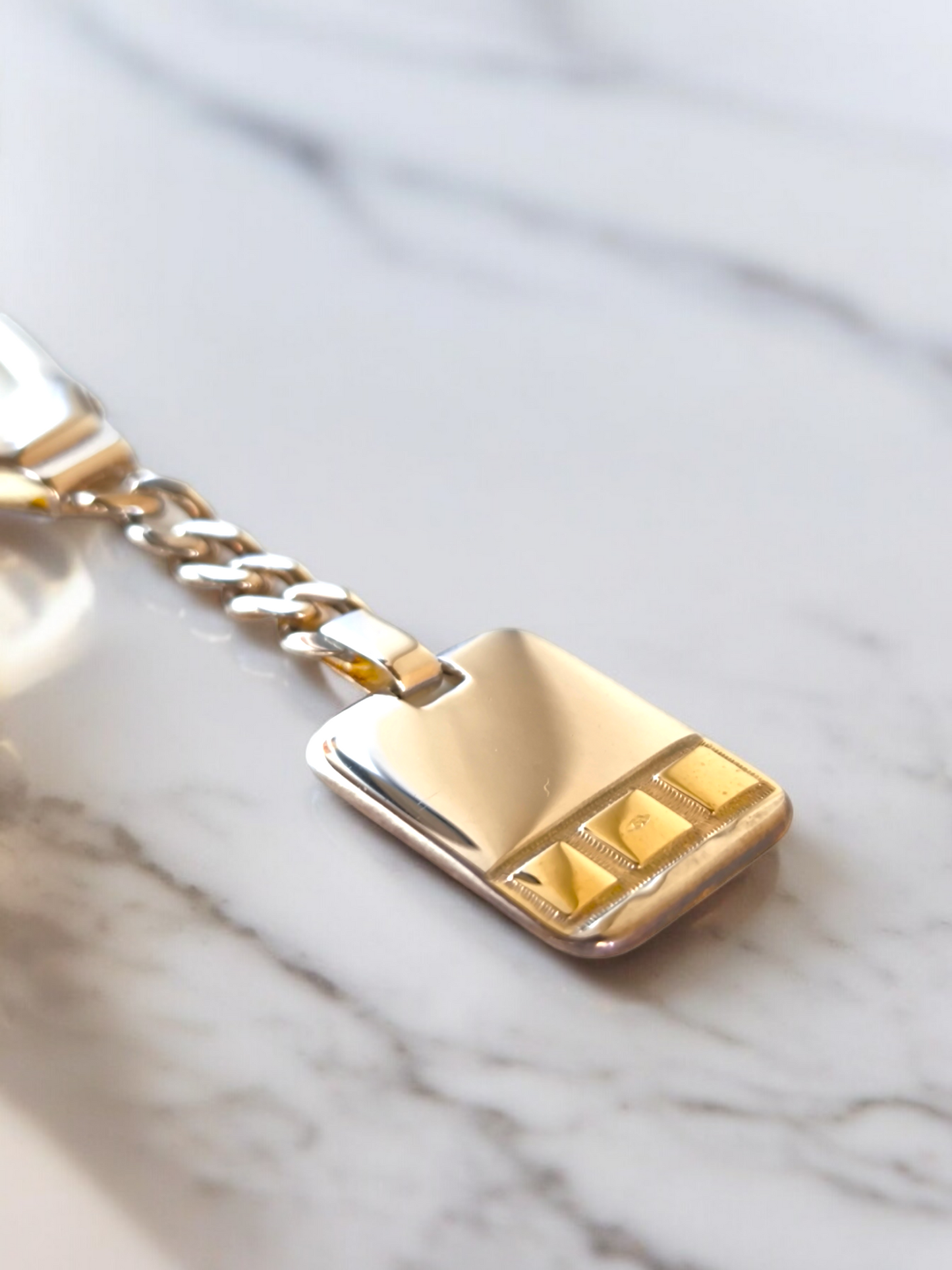 Gold and silver rectangle key ring