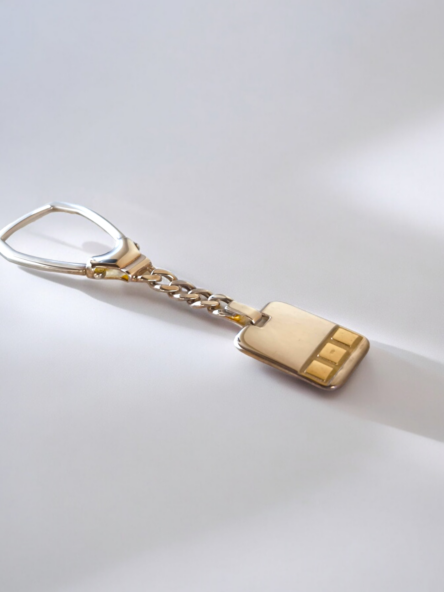 Gold and silver rectangle key ring