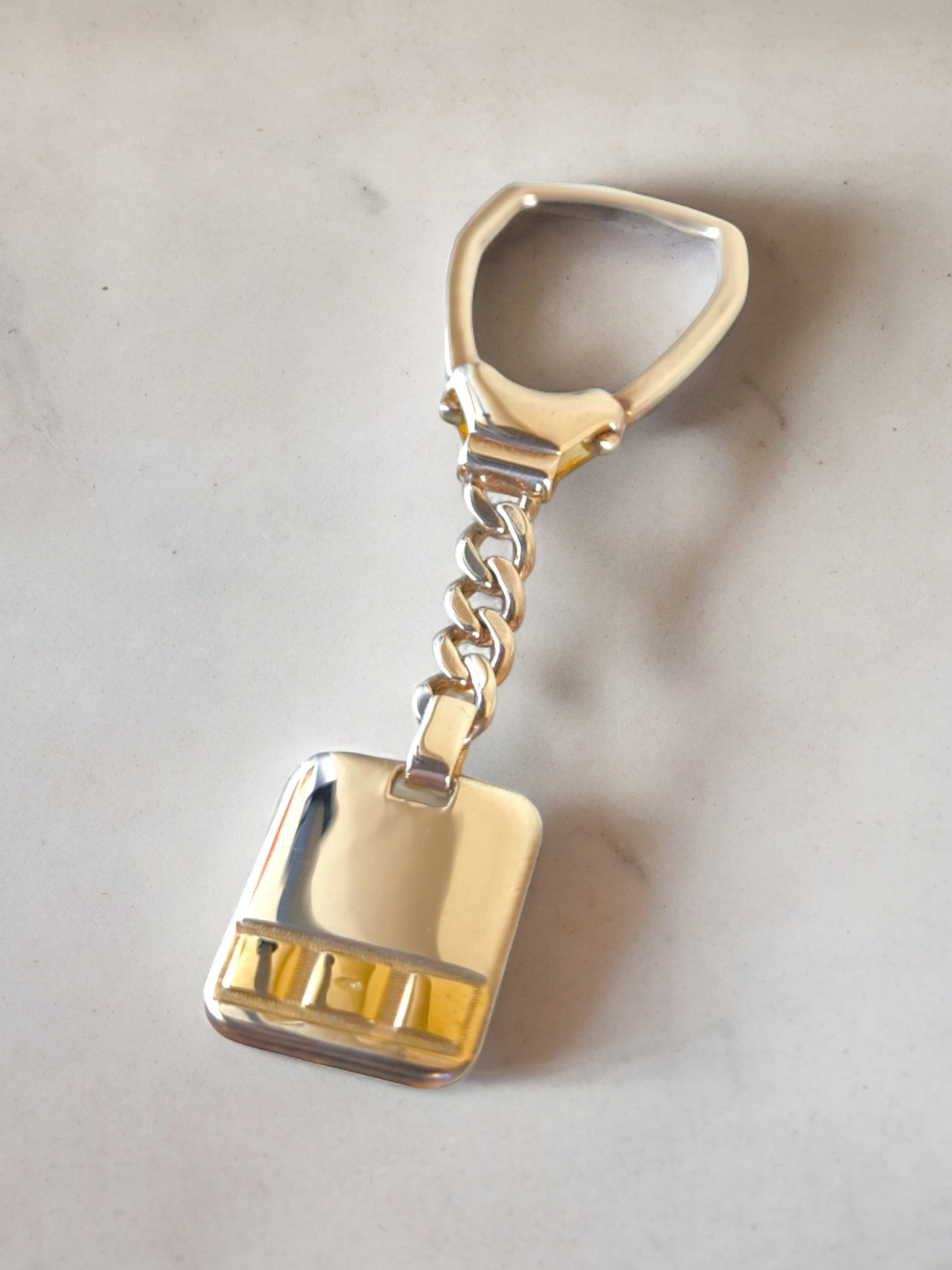 Gold and silver rectangle key ring