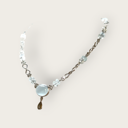 Gold necklace with diamonds and aquamarine