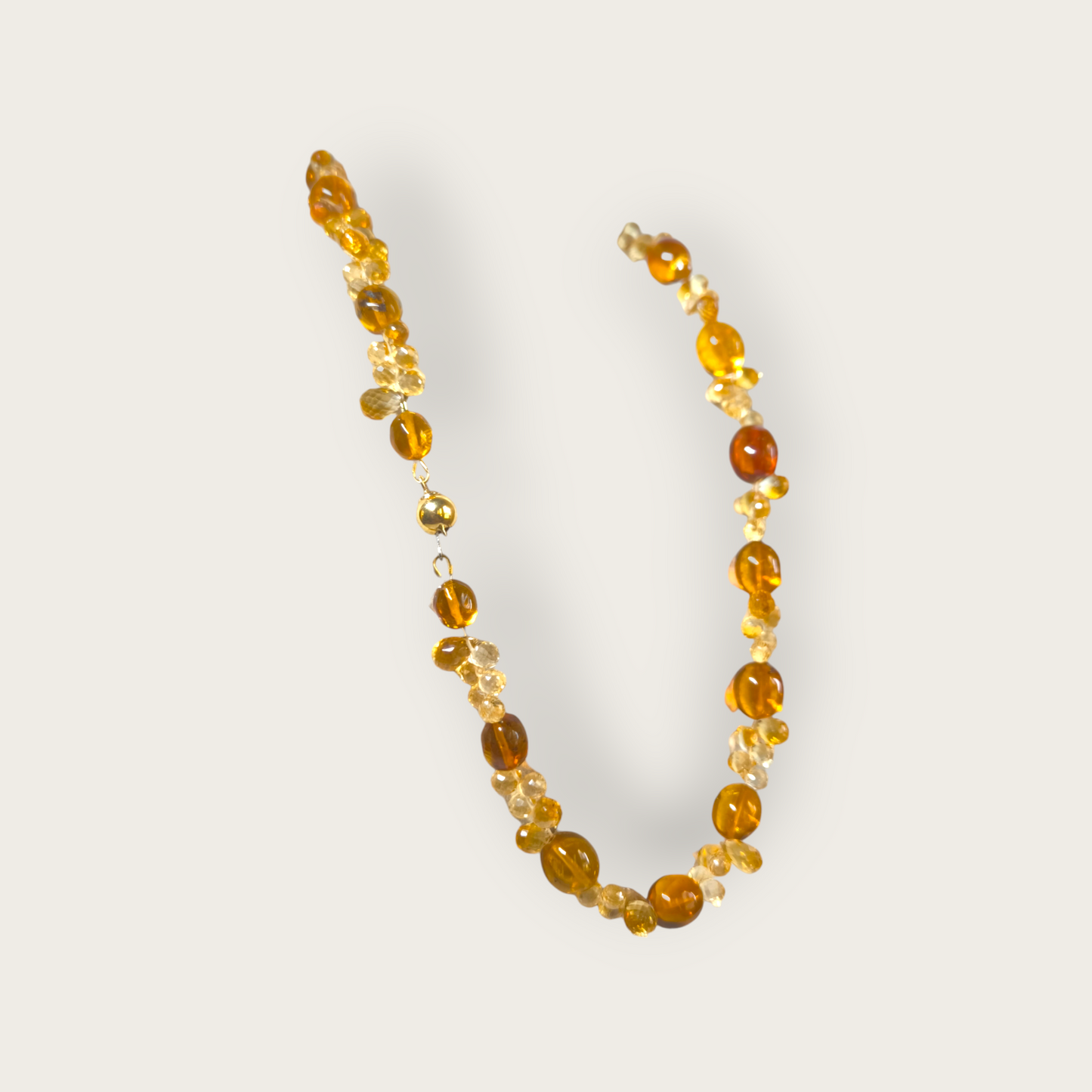 Gold necklace with Dominican amber and citrine quartz