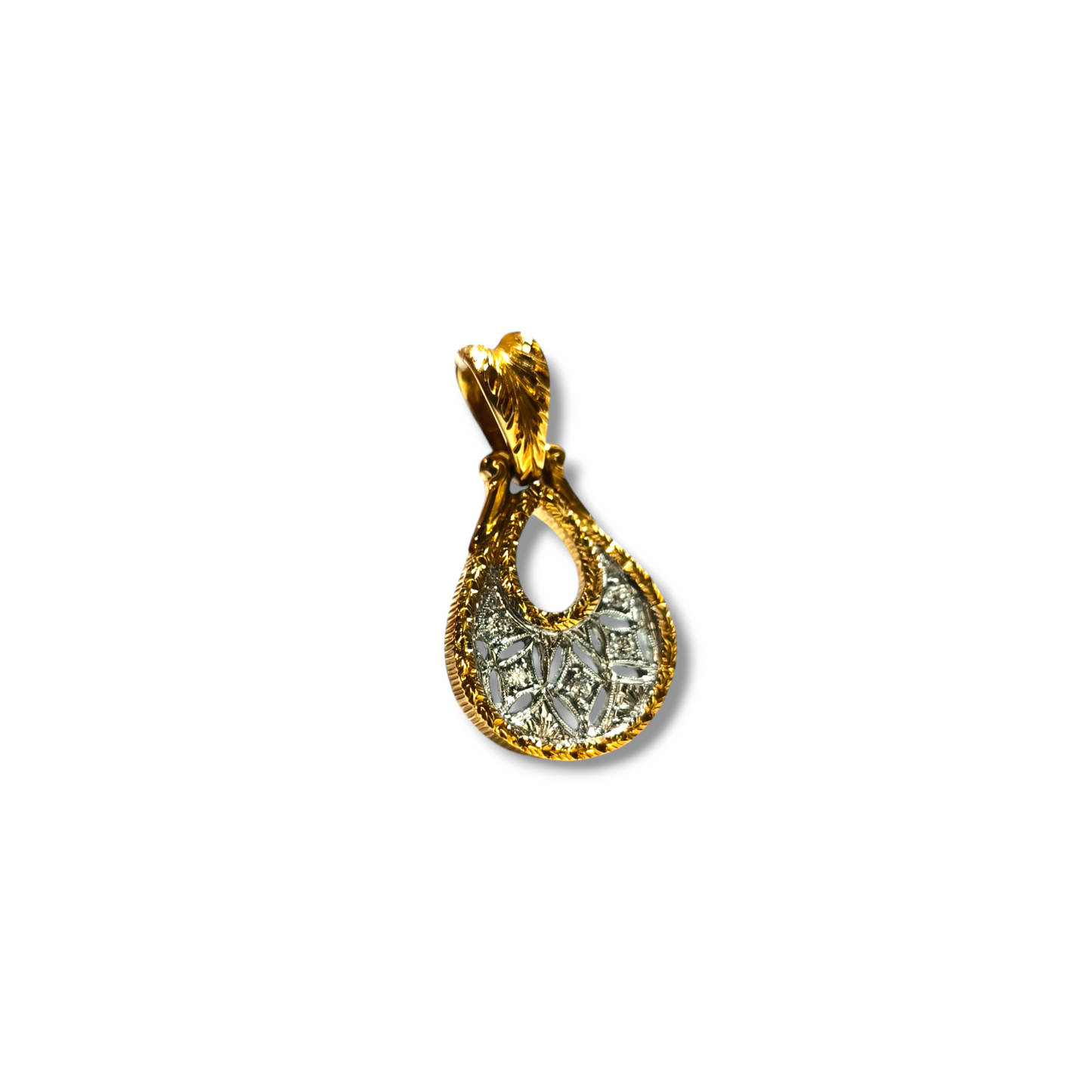 Hand-engraved gold pendant with diamonds