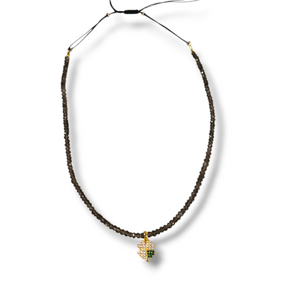 Four-leaf clover necklace in gold and semi-precious stones