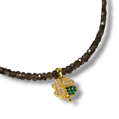 Four-leaf clover necklace in gold and semi-precious stones