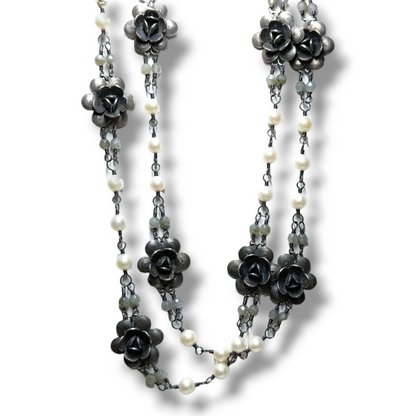 Long silver filigree necklace with pearls, flowers and quartz