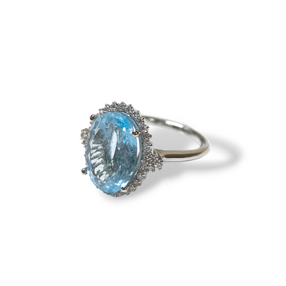 Gold ring with aquamarine and diamonds