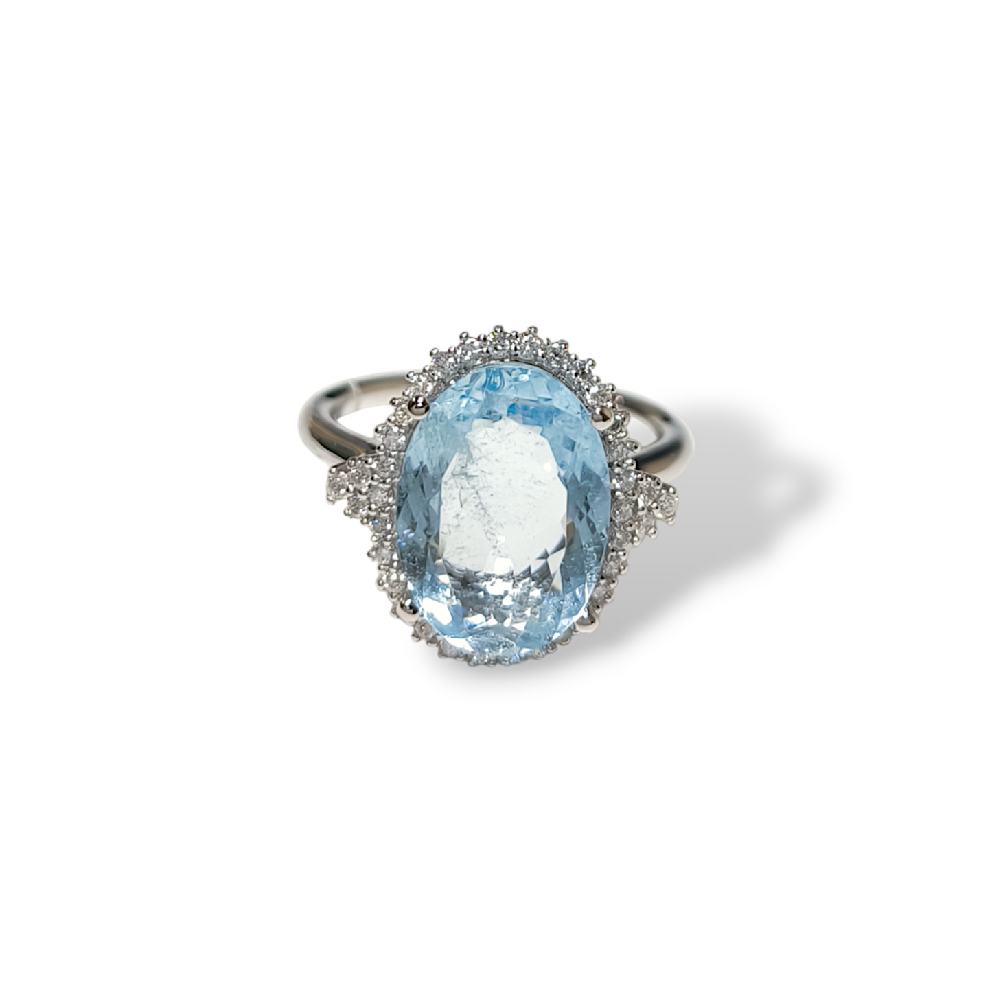 Gold ring with aquamarine and diamonds