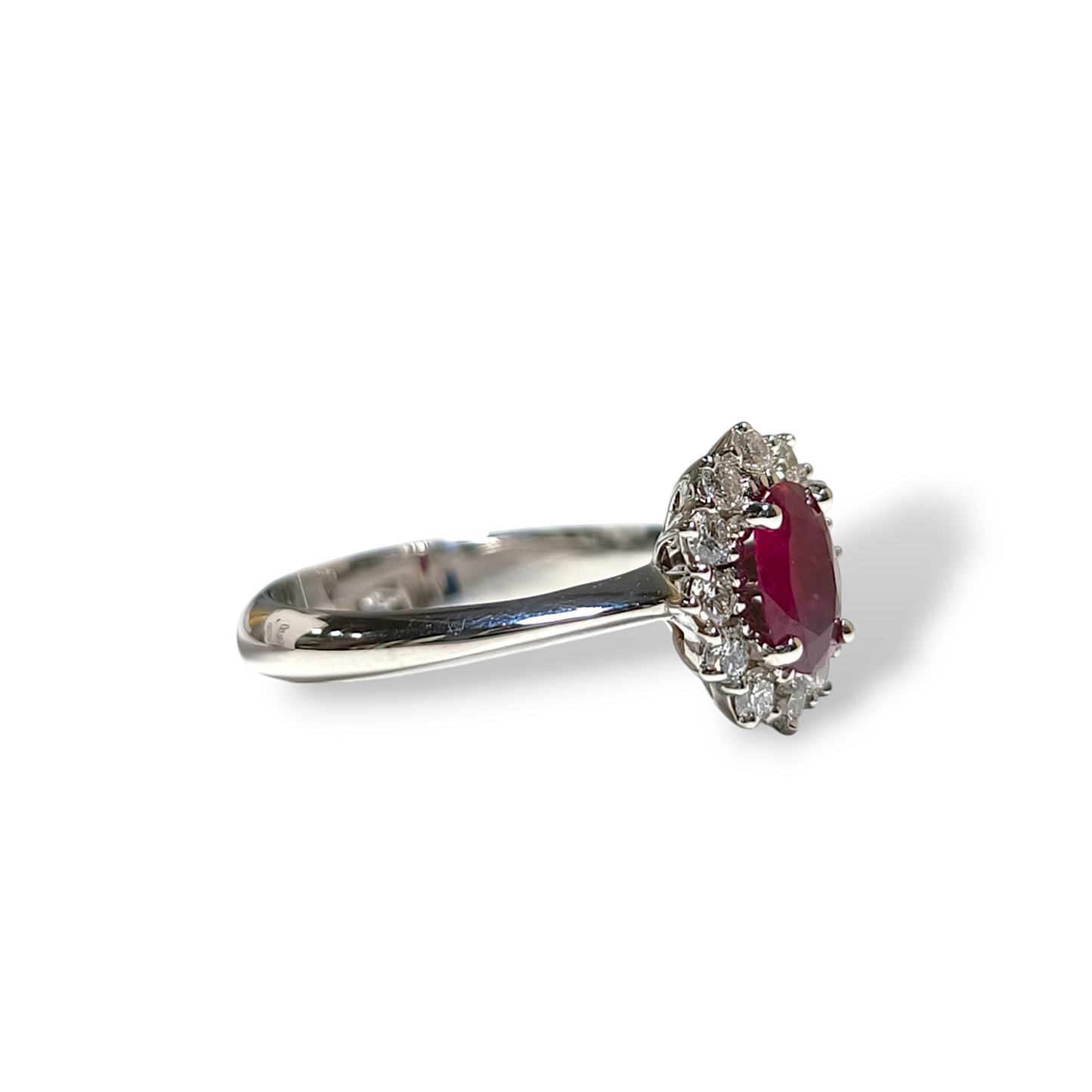 Gold ring with diamonds and ruby