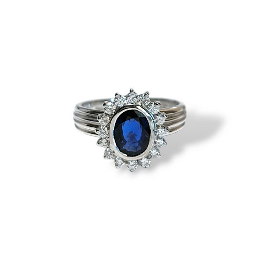 Gold ring with blue sapphire and diamonds