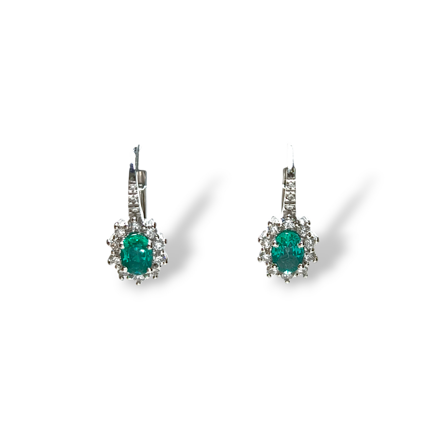 Gold earrings with diamonds and emeralds