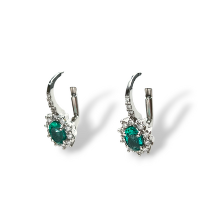 Gold earrings with diamonds and emeralds