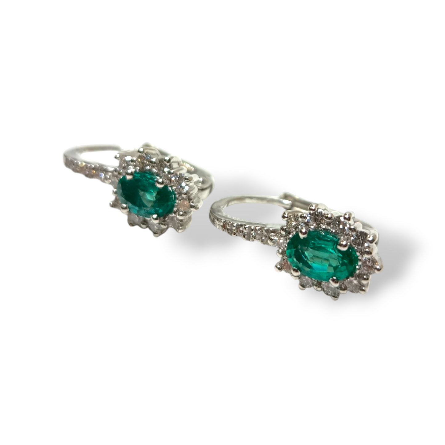 Gold earrings with diamonds and emeralds