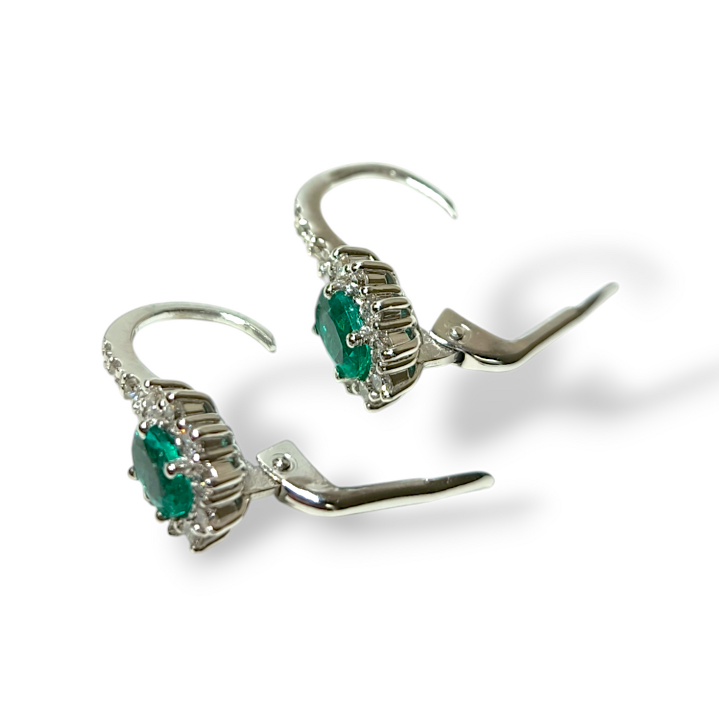 Gold earrings with diamonds and emeralds