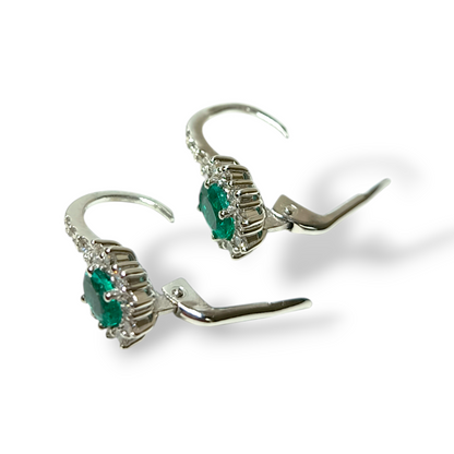 Gold earrings with diamonds and emeralds