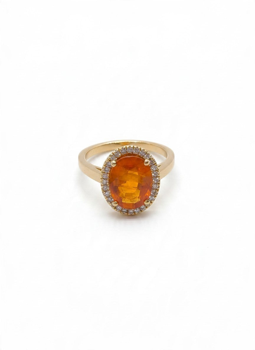 Anello in oro giallo 18 kt con zaffiro arancione e diamanti