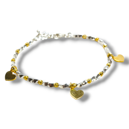 Bracciale Bracciale in argento a dadini con elementi dorati e cuori pendenti - Gioielli Pavan