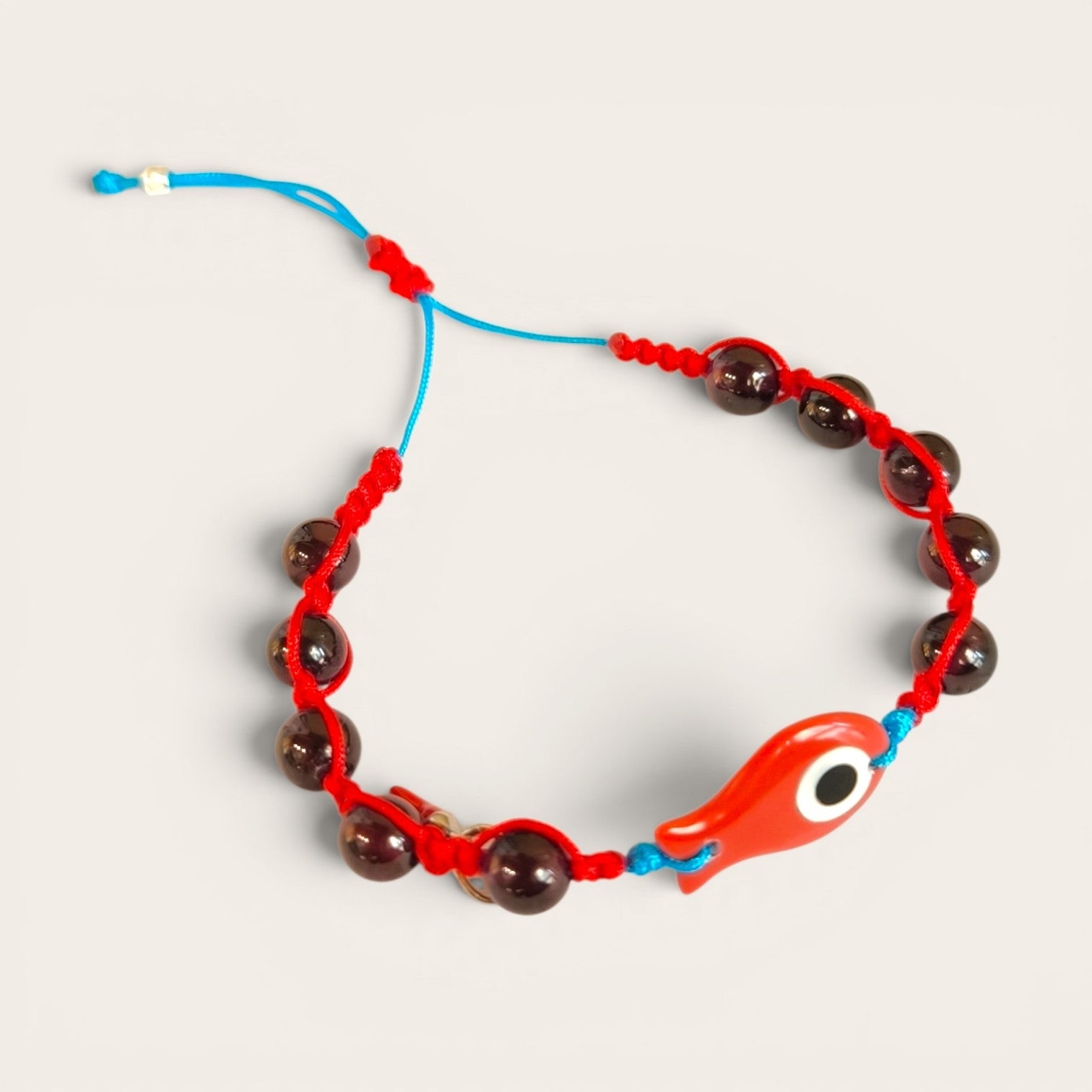 Bracciale Bracciale Nautico con Pesciolino in Turchese Rossa, Granati e Cornetto Portafortuna - Gioielli Pavan