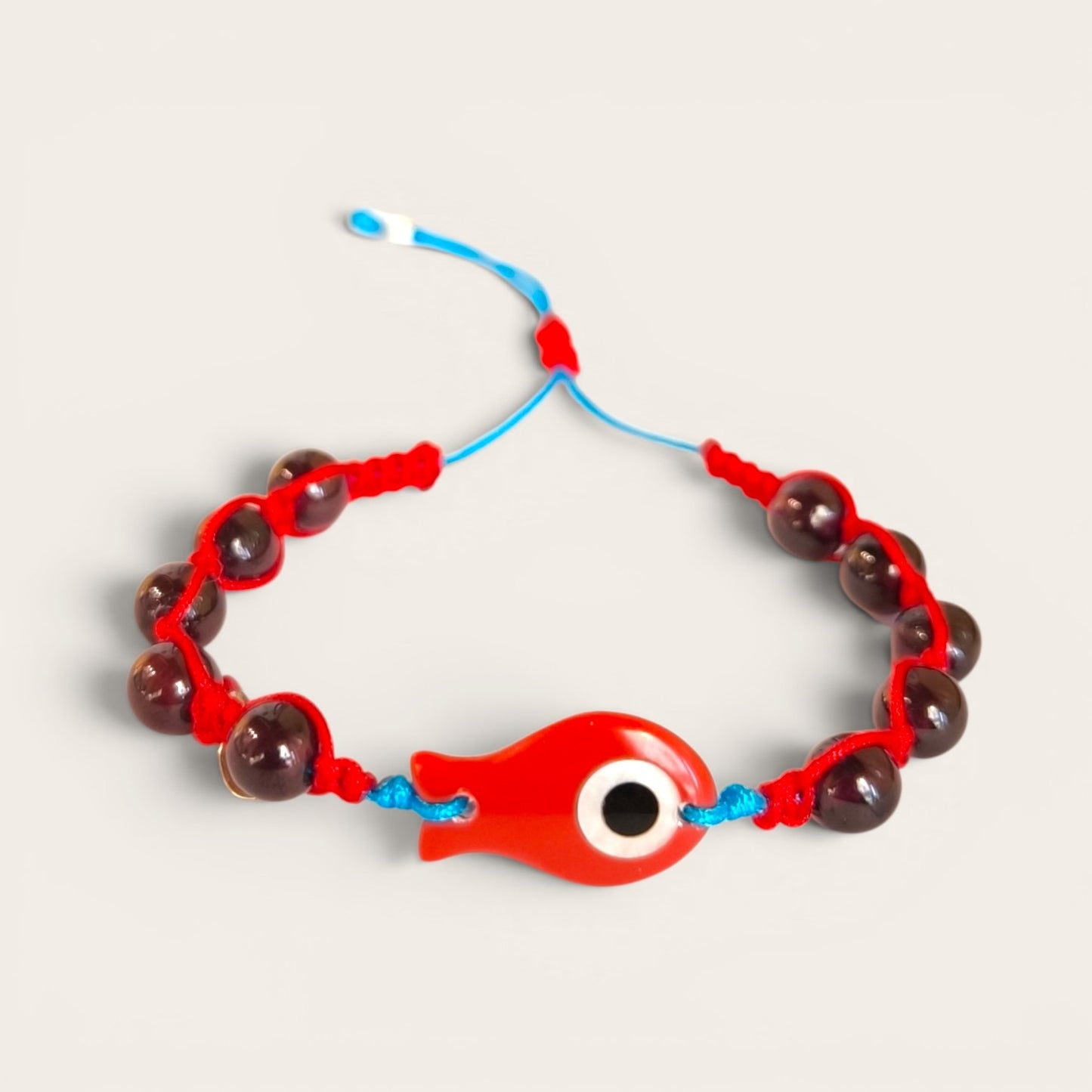 Bracciale Bracciale Nautico con Pesciolino in Turchese Rossa, Granati e Cornetto Portafortuna - Gioielli Pavan