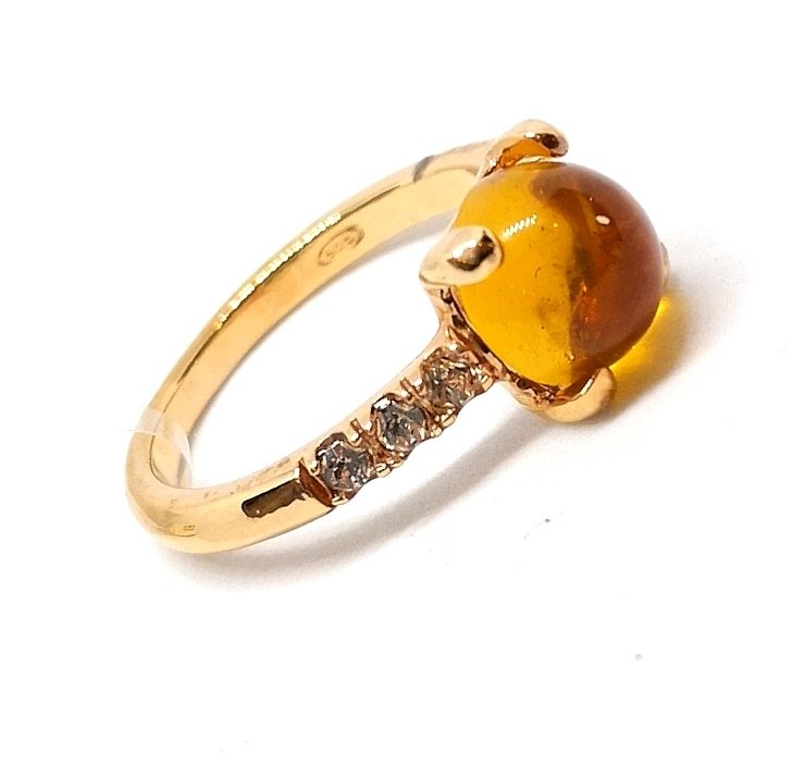 Yellow gold silver ring with yellow cabochon and zirconia 