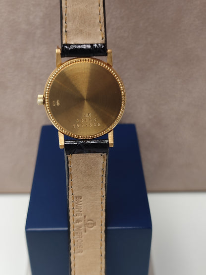 Baume &amp; Mercier - Classic woman in gold