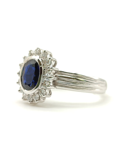 Gold ring with blue sapphire and diamonds