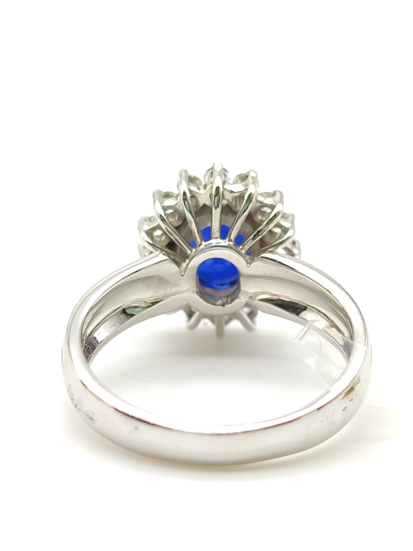 Gold ring with blue sapphire and diamonds