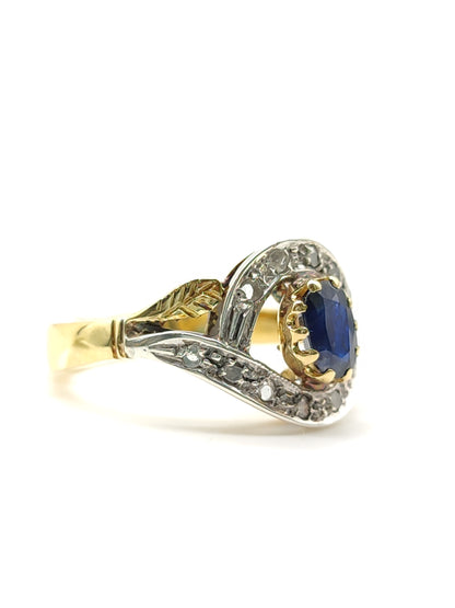 Gold ring with sapphire and diamonds