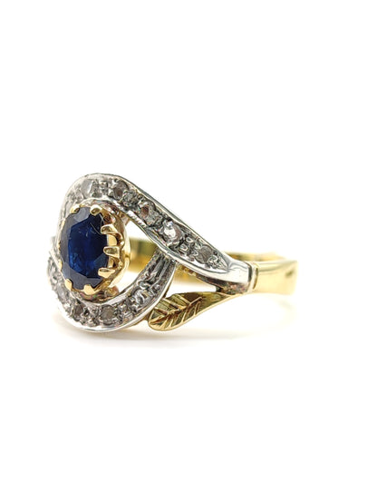 Gold ring with sapphire and diamonds