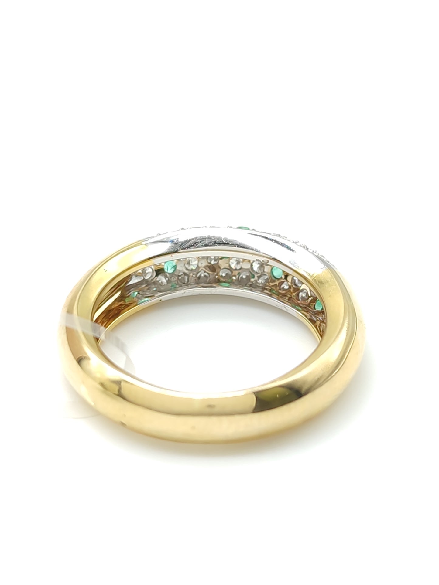 Gold ring with emeralds and diamonds