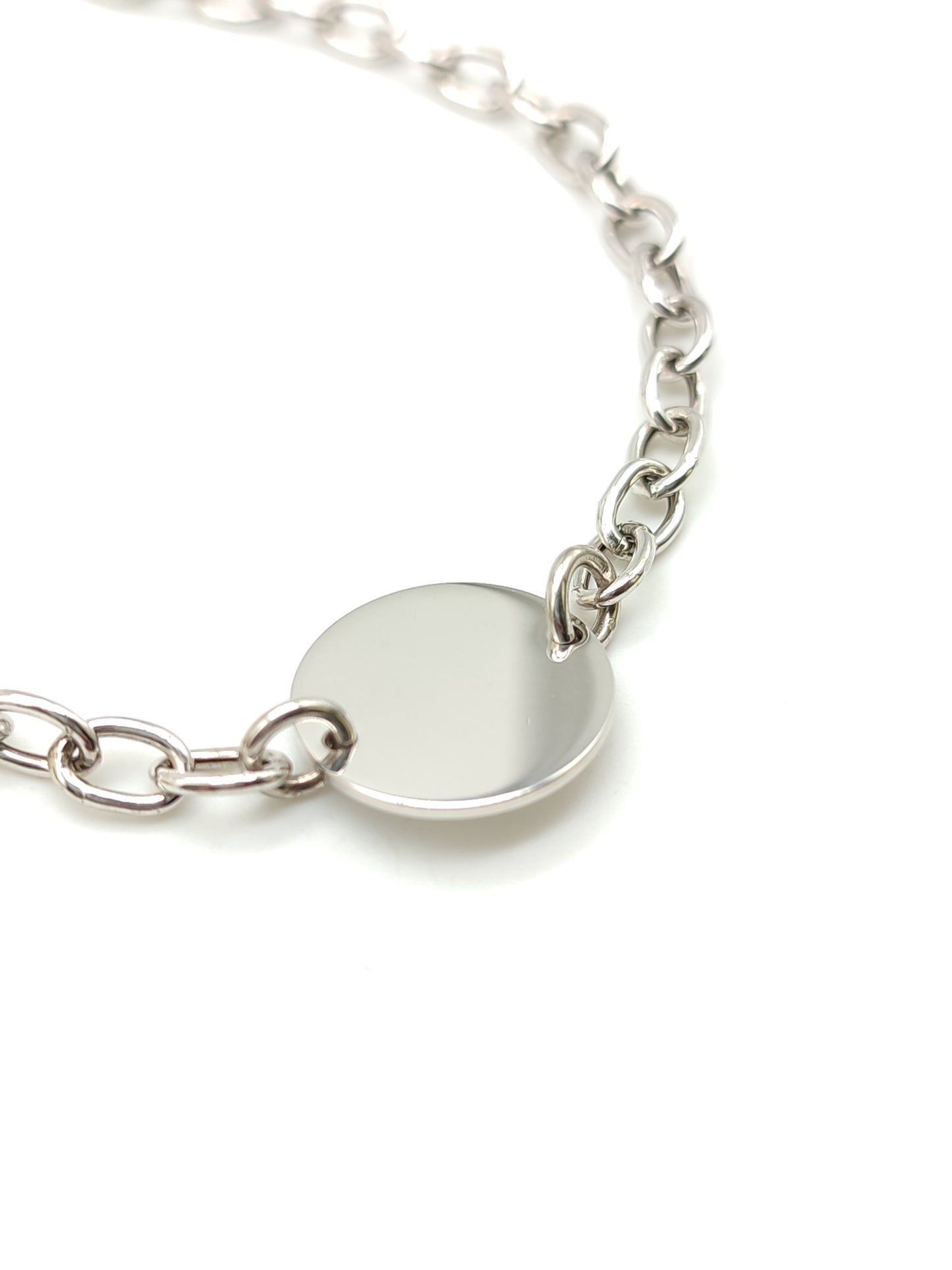 Silver bracelet with round button for engraving
